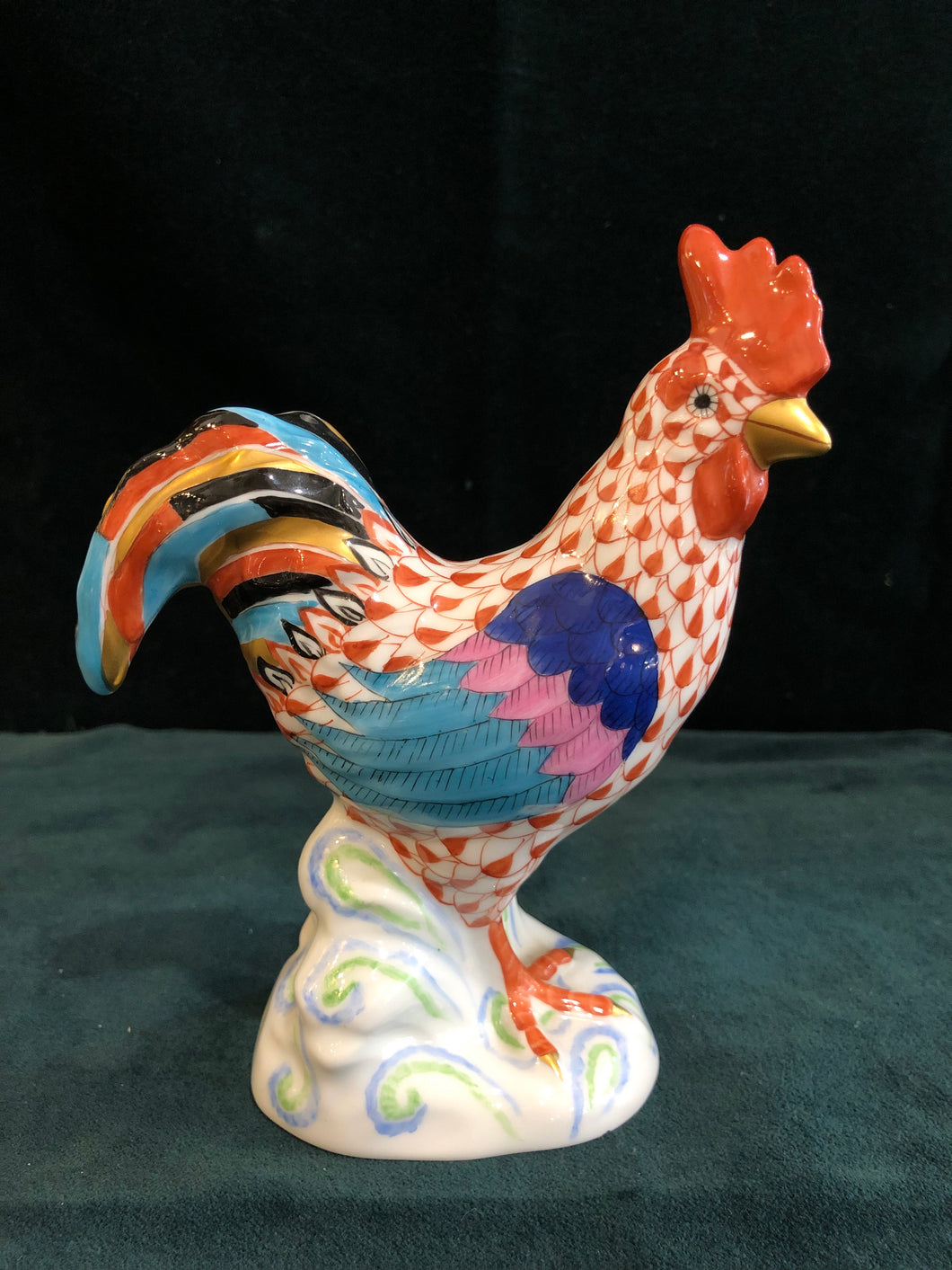 A hand-painted porcelain rooster by Herend