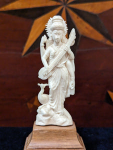 Ivory Carving of a Deity with a Sitar & Crane