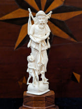 Load image into Gallery viewer, Ivory Carving of a Travelling Man, Child &amp; Snake

