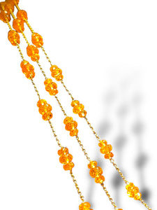 18 KT YG Triple Strand Chain with Mandarin Garnets